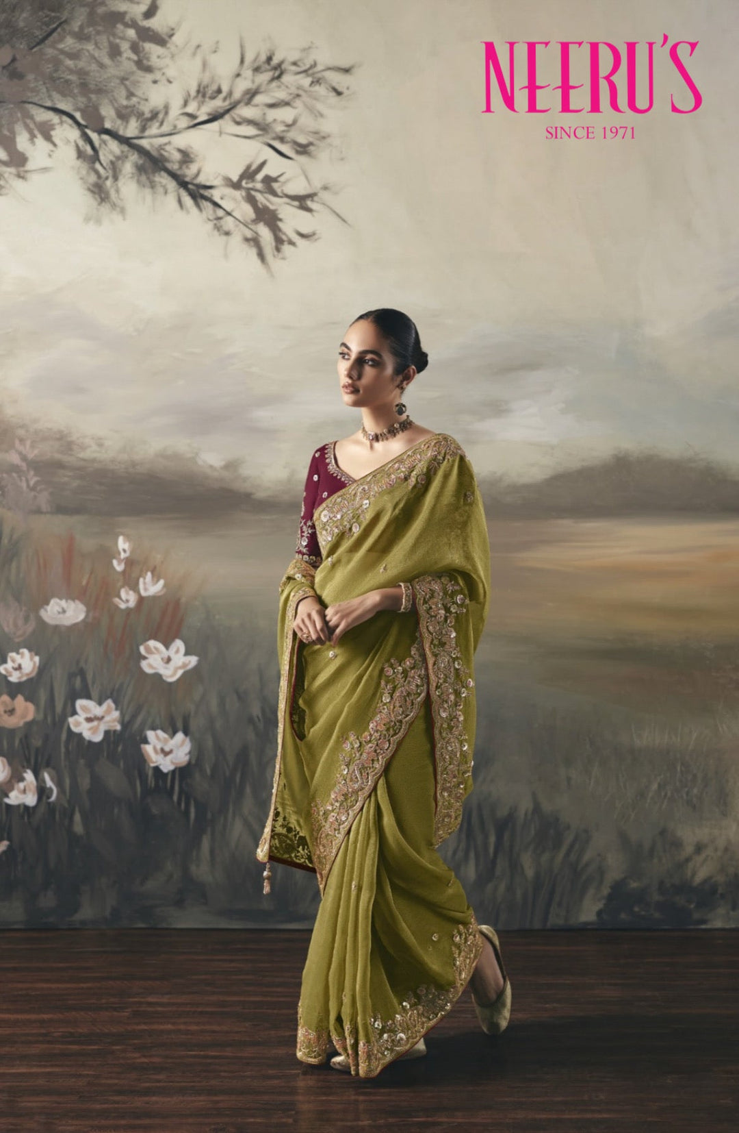 Neerus Green tissue hand embroidered saree - front view
