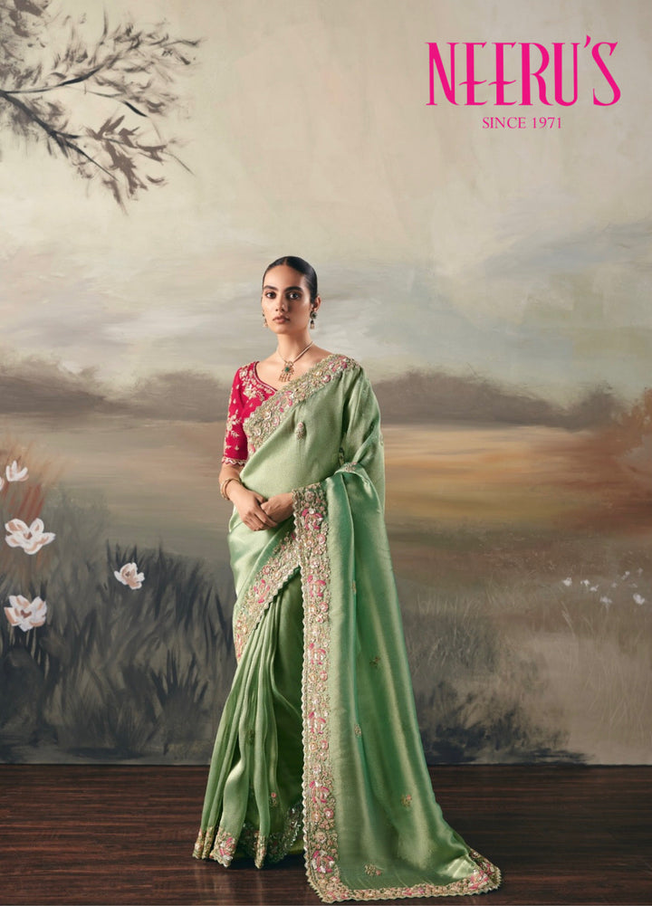 Neerus Green tissue embellished saree with sequins and zari work - front view