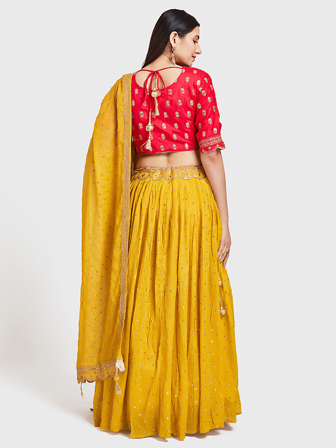 Neerus Yellow Georgette Embellished Lehenga Ghagra Set - back view