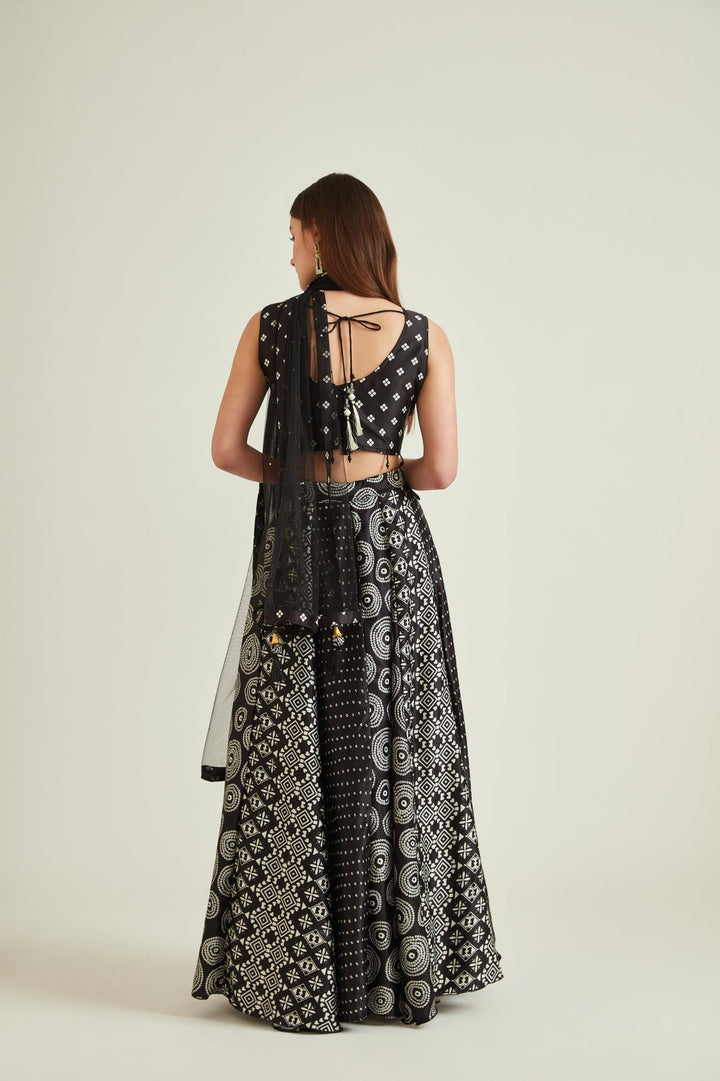 Neerus Black satin mirror work lehenga set - side view