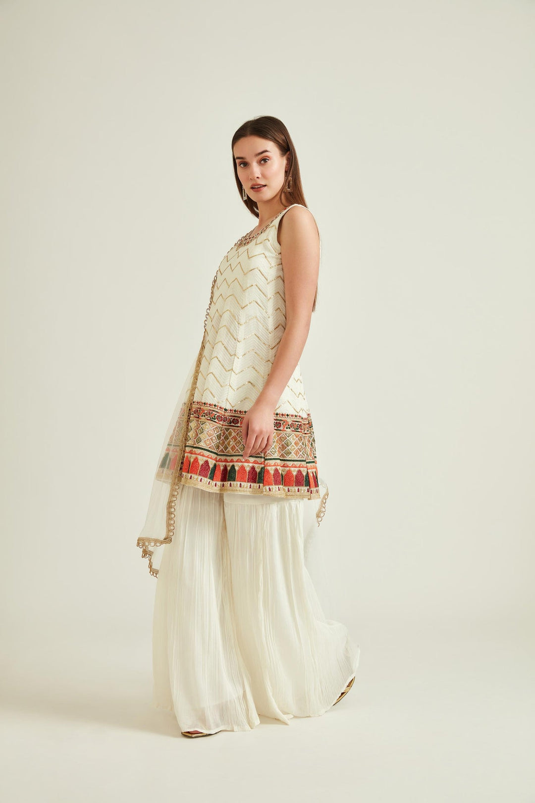 Neerus White georgette embroidered kurta set with sharara and dupatta - front view