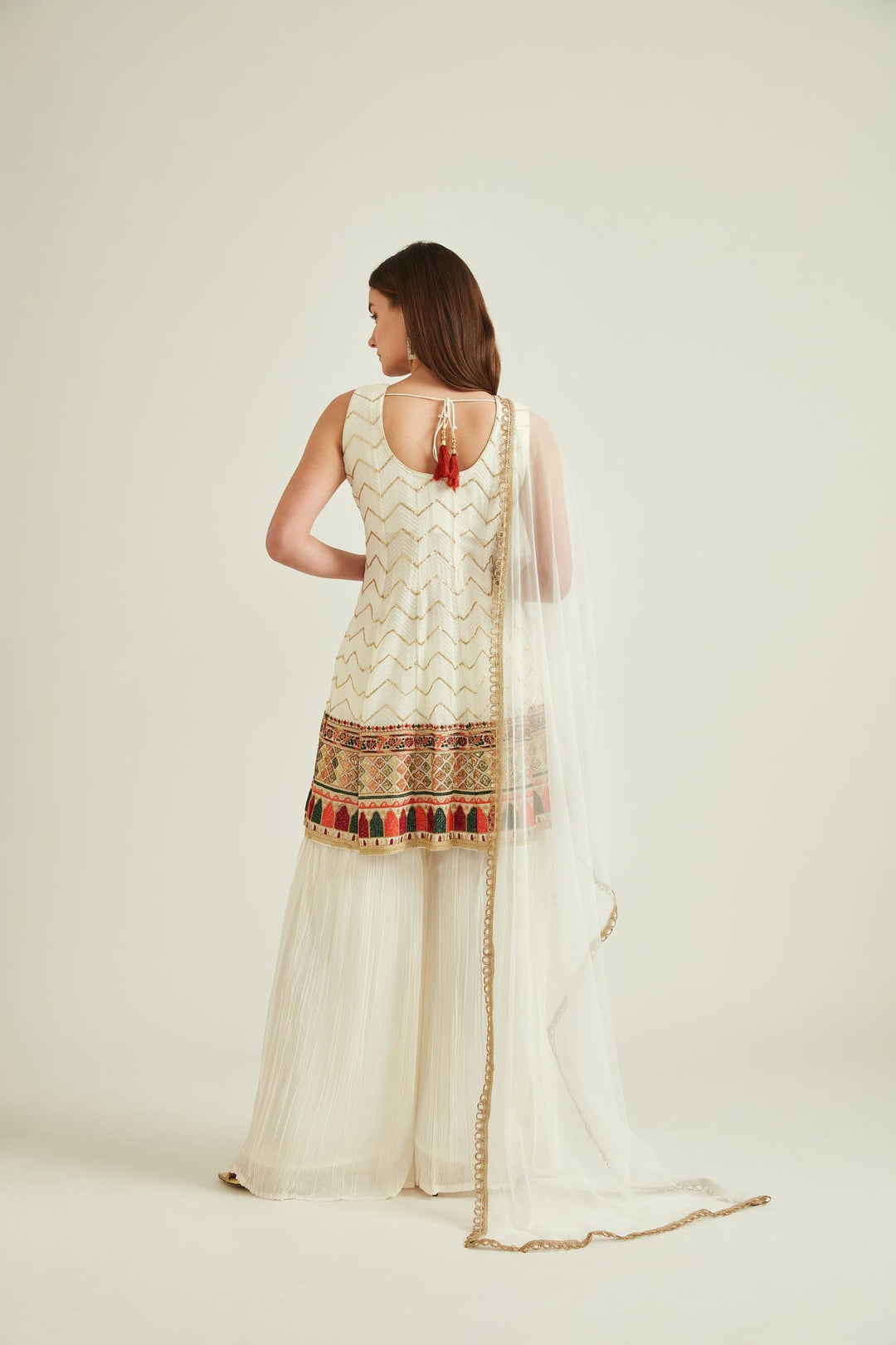 Neerus White georgette embroidered kurta set with sharara and dupatta - back view
