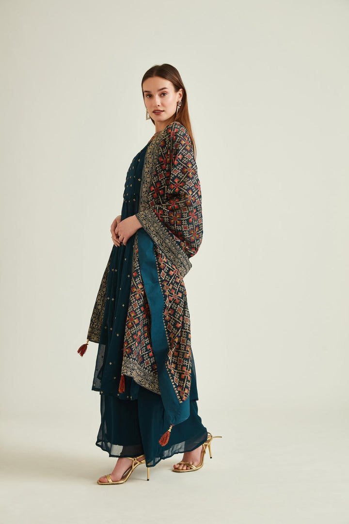 Neerus Blue georgette embellished kurta set - back view
