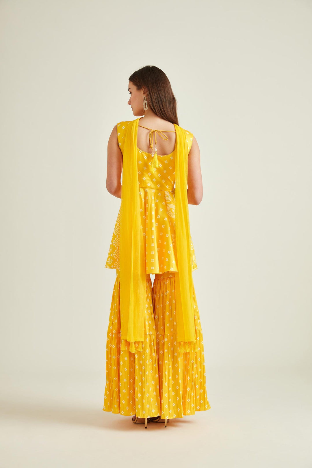 Neerus Yellow satin straight kurta set - back view