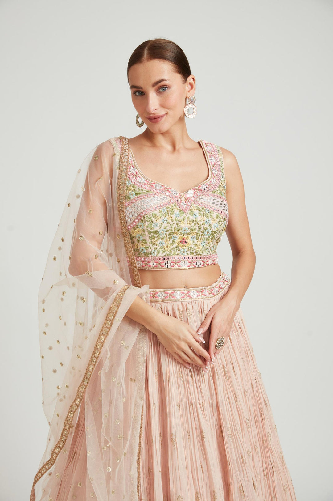 Neerus Orange georgette embellished lehenga choli - back view