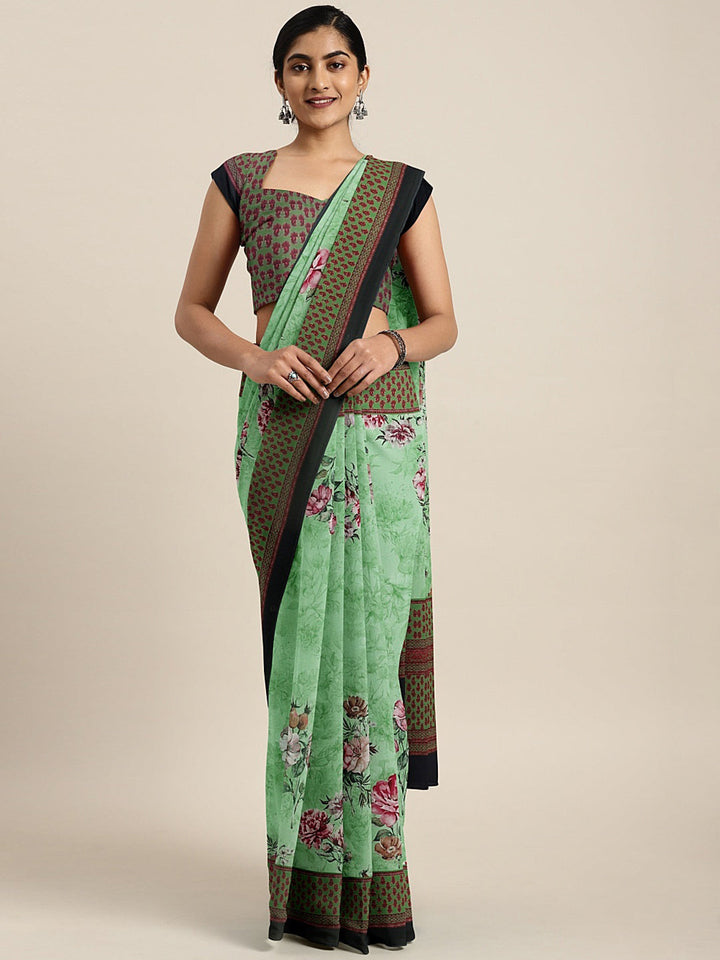 Neerus Green crepe printed saree with blouse piece - front view