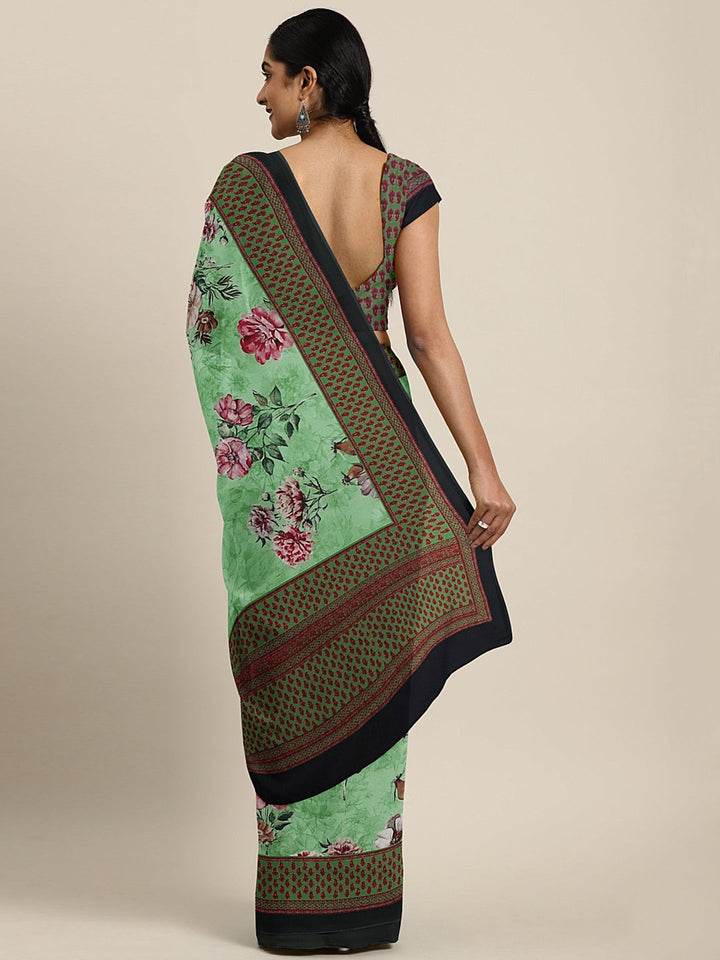Neerus Green crepe printed saree with blouse piece - back view