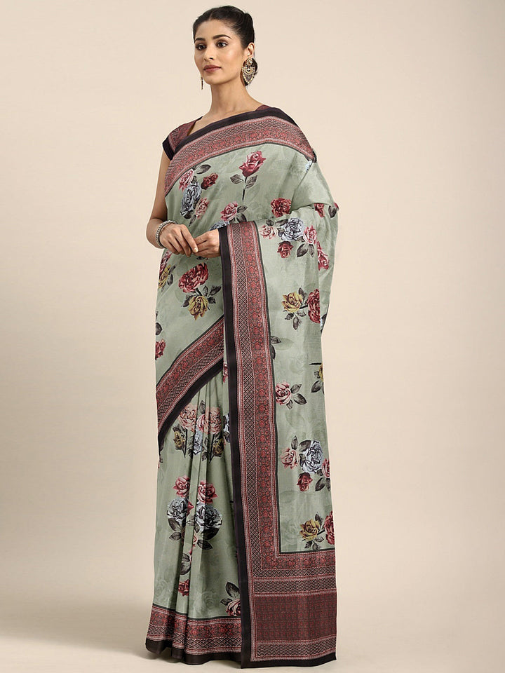Neerus Green crepe printed saree with blouse piece - front view