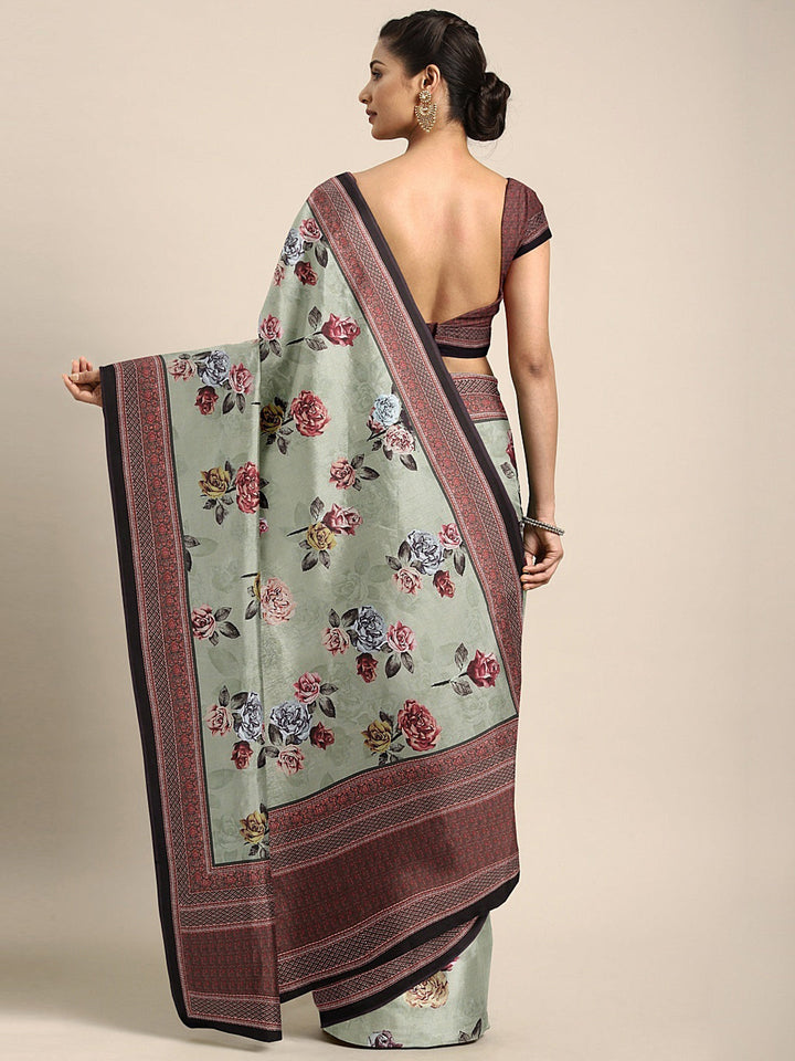 Neerus Green crepe printed saree with blouse piece - back view