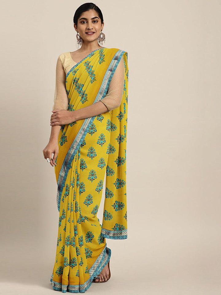 Neerus Yellow georgette printed saree with blouse piece - front view