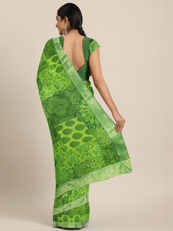 Neerus Green georgette printed saree - back view