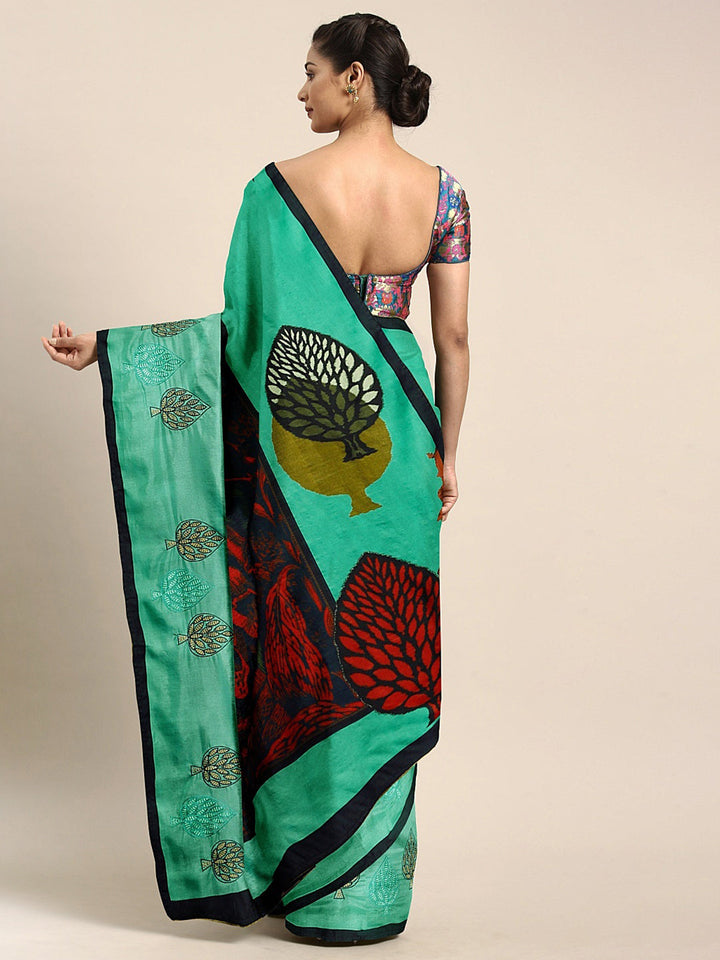 Neerus Green printed saree with blouse piece - back view