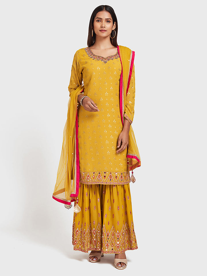 Neerus Yellow embellished anarkali sharara set - front view