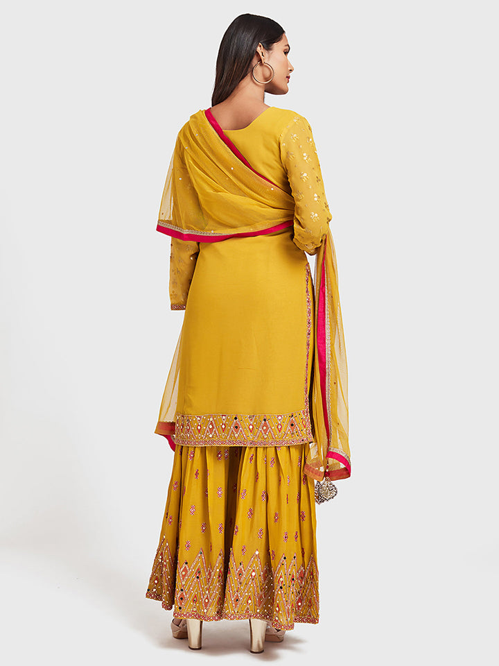 Neerus Yellow embellished anarkali sharara set - side view