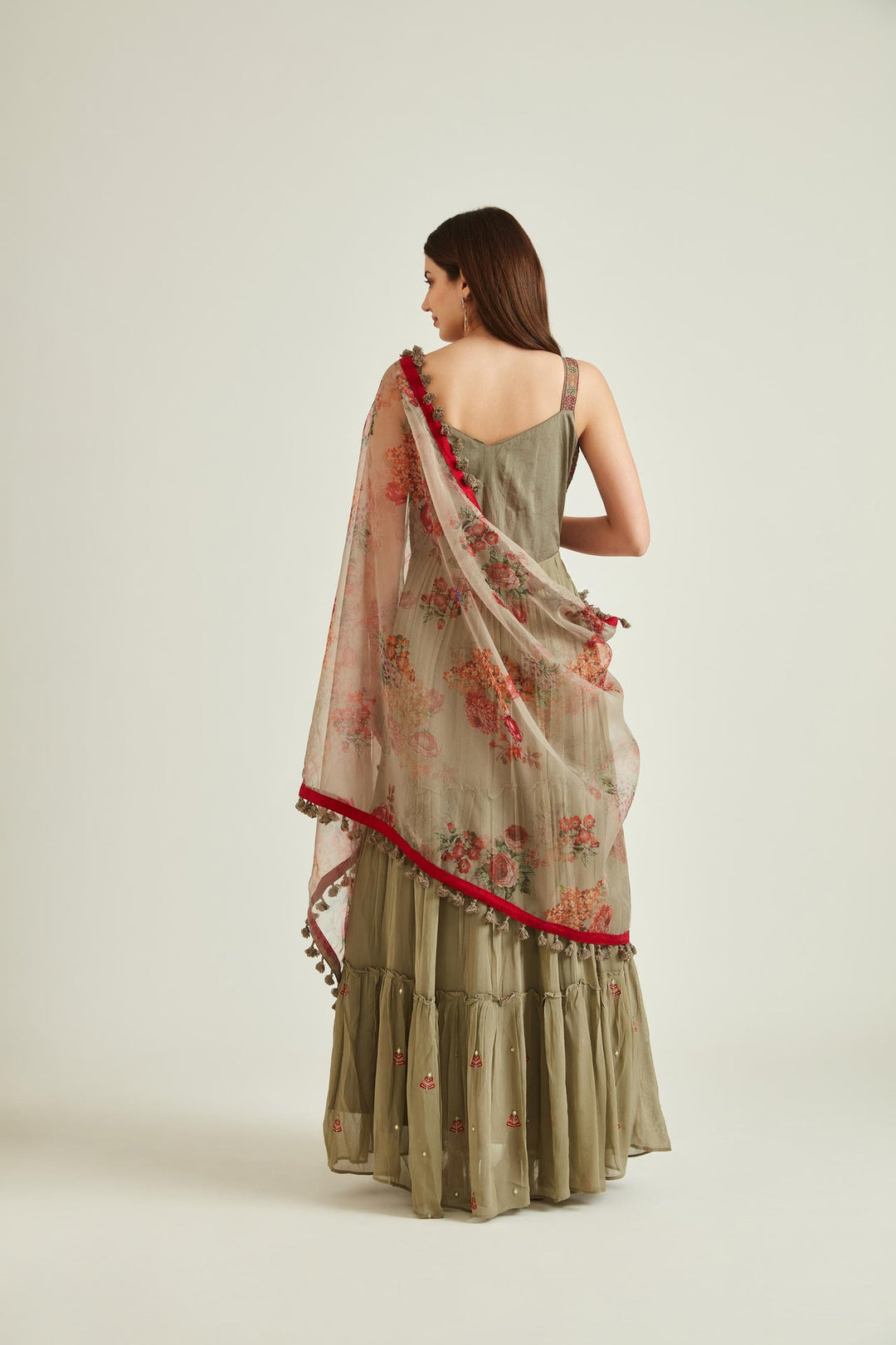 Neerus Green georgette mirror work tiered gown with dupatta - back view