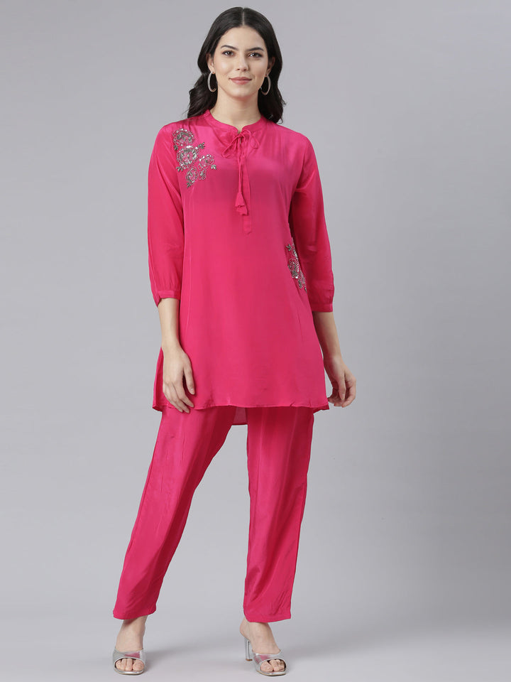 Neerus Pink solid straight kurta set with trouser - front view