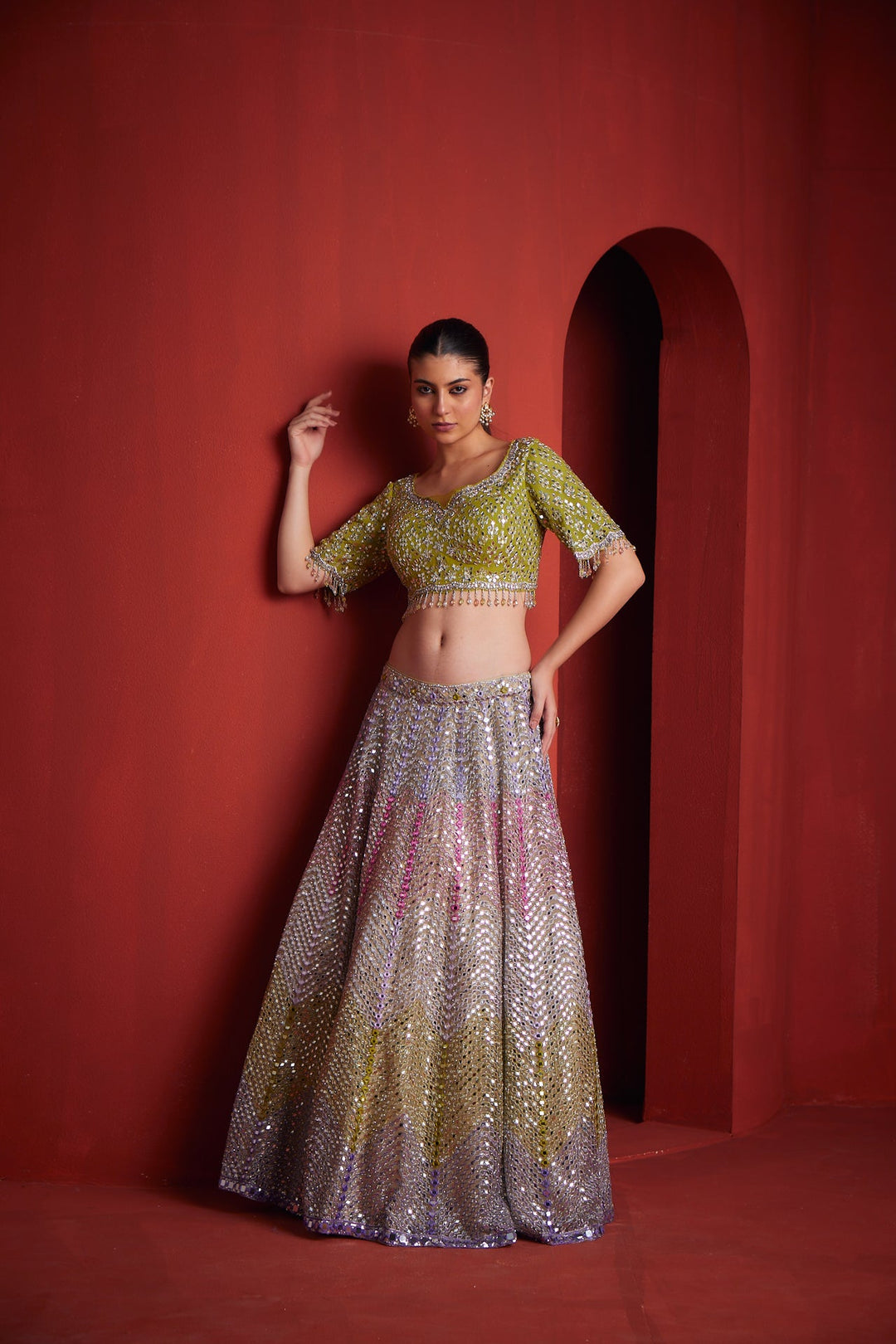 Neerus Green silk embroidered lehenga set - side view