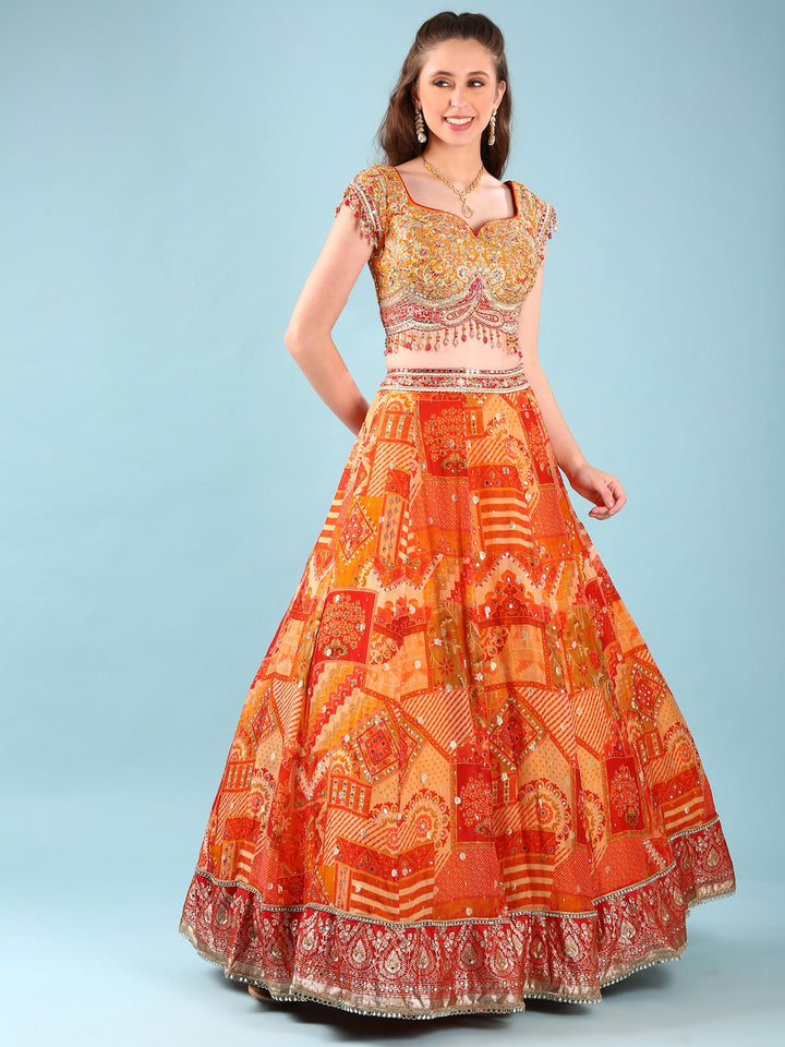 Neerus Orange Chinon hand embroidered ghagra lehenga set - back view