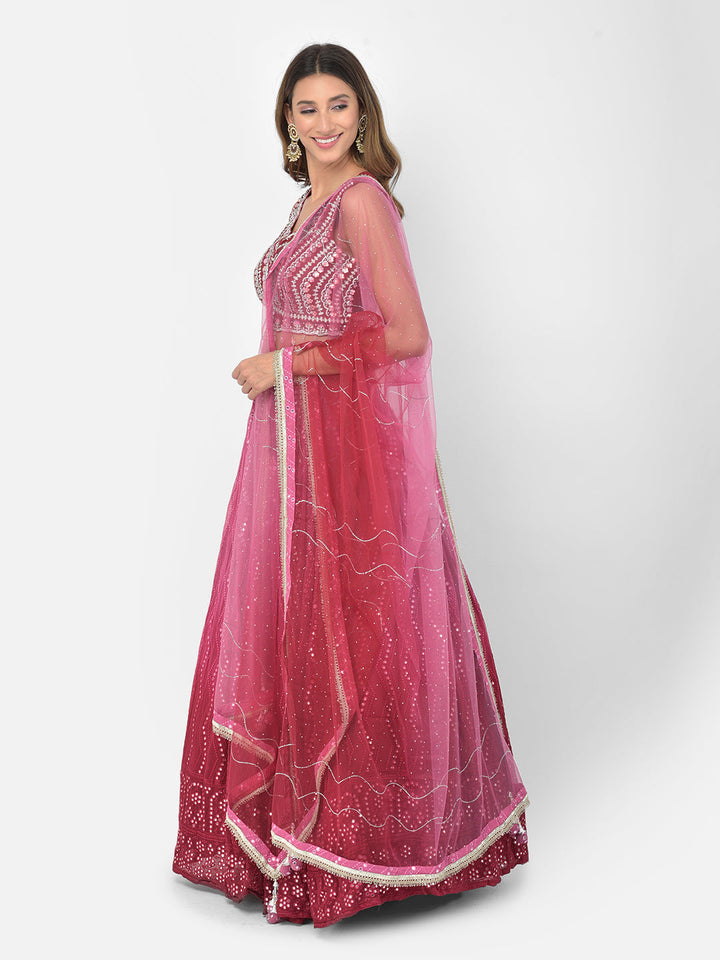 Neerus Pink georgette mirror work lehenga choli - back view