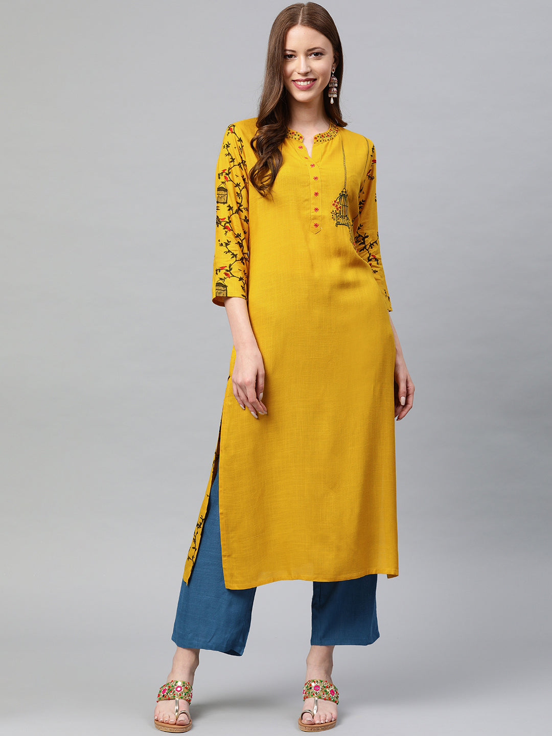 Neerus Yellow rayon embroidered straight kurta - front view