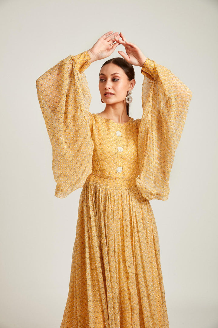 Neerus Yellow georgette maxi gown - side view
