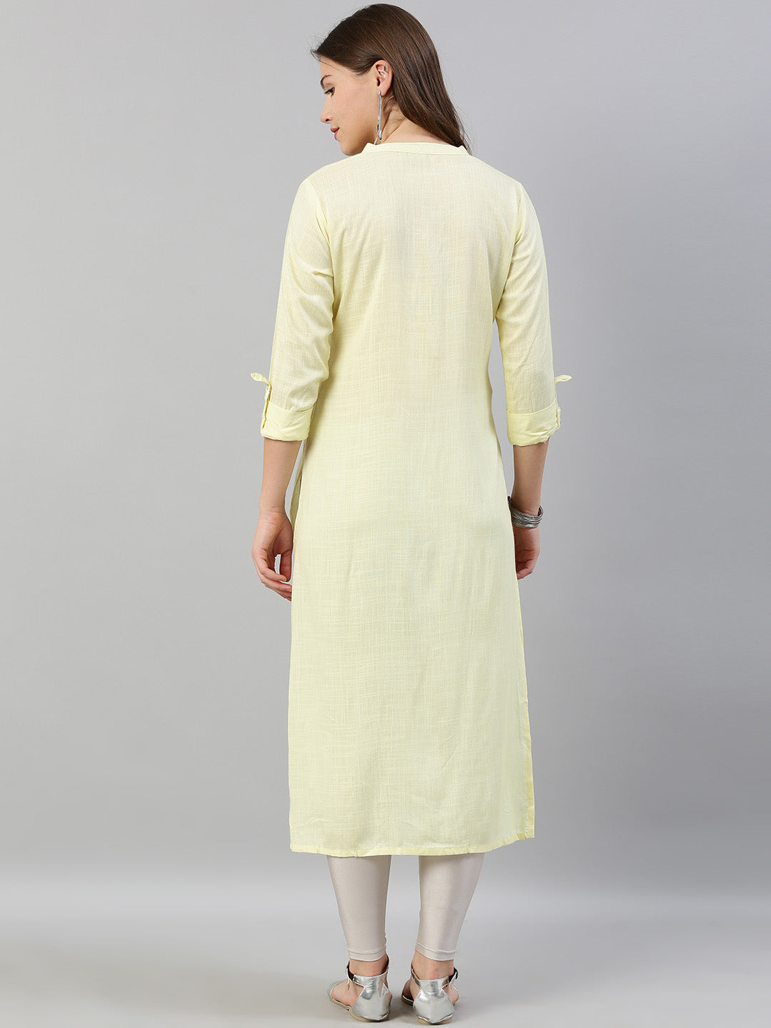 Neerus Yellow rayon embroidered straight kurti - side view