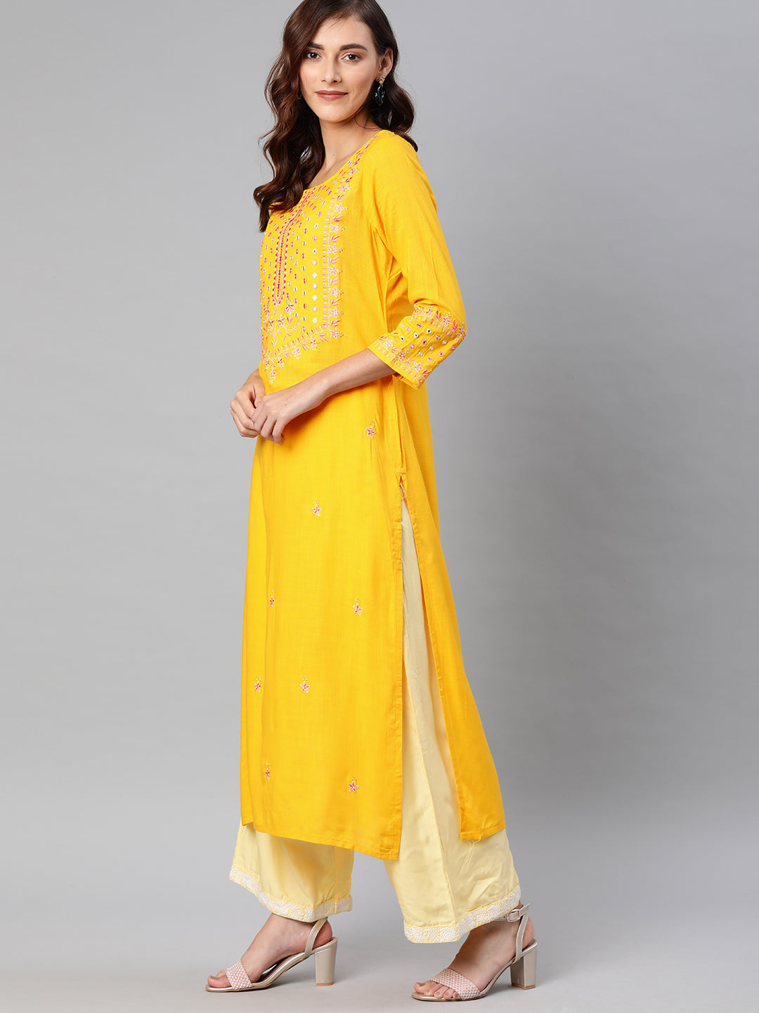 Neerus Yellow rayon embroidered straight kurta - back view