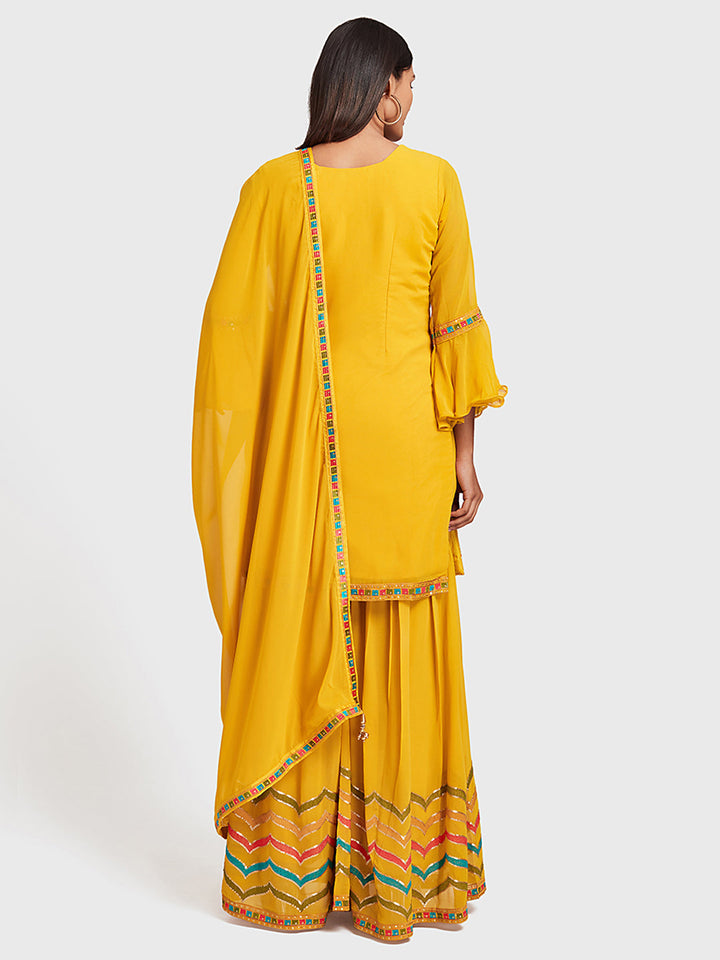 Neerus Yellow embellished anarkali sharara set - side view