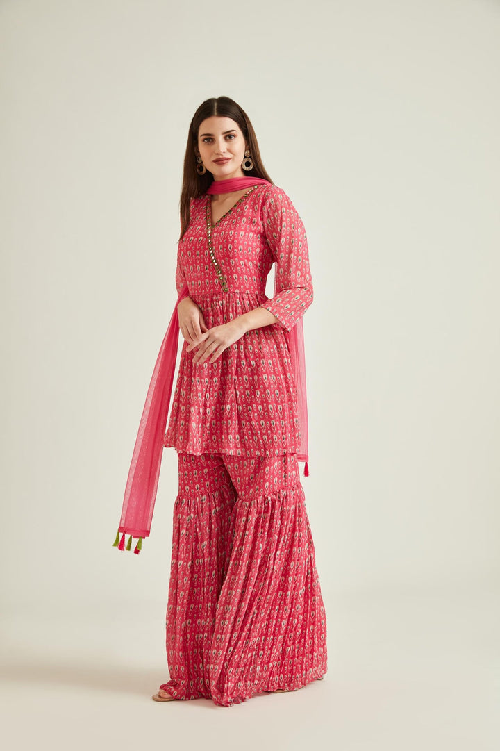 Neerus Pink georgette embellished kurta set - front view