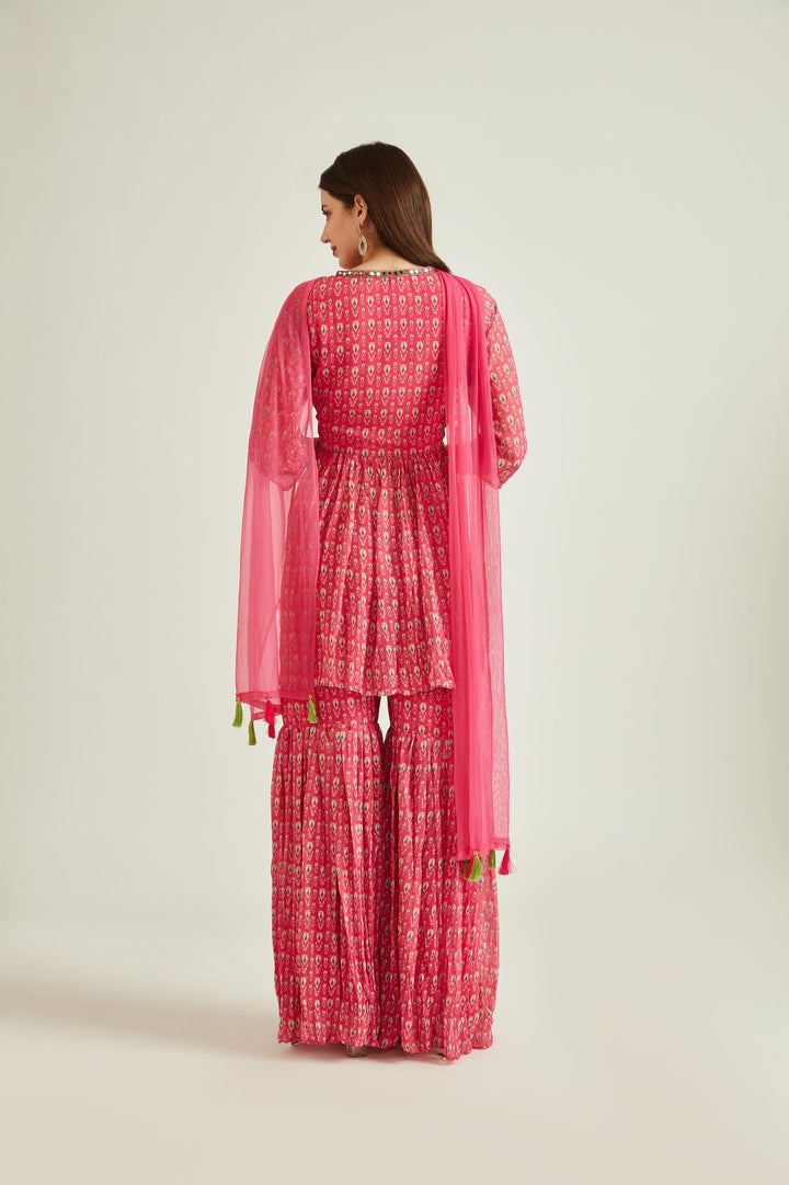 Neerus Pink georgette embellished kurta set - back view
