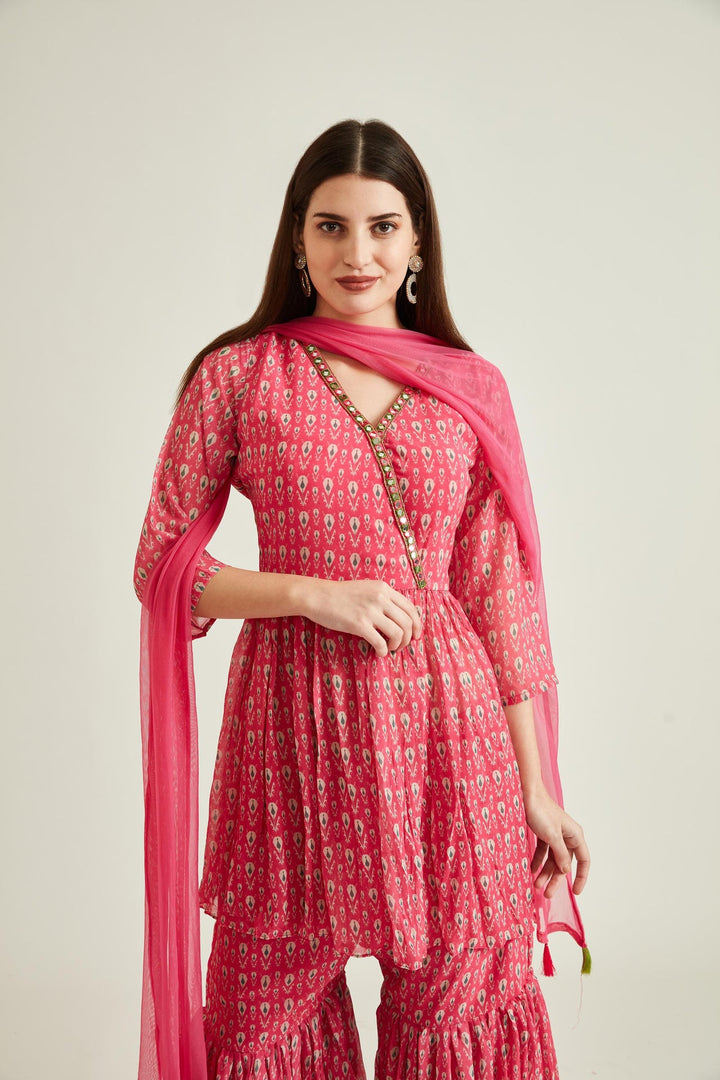 Neerus Pink georgette embellished kurta set - side view