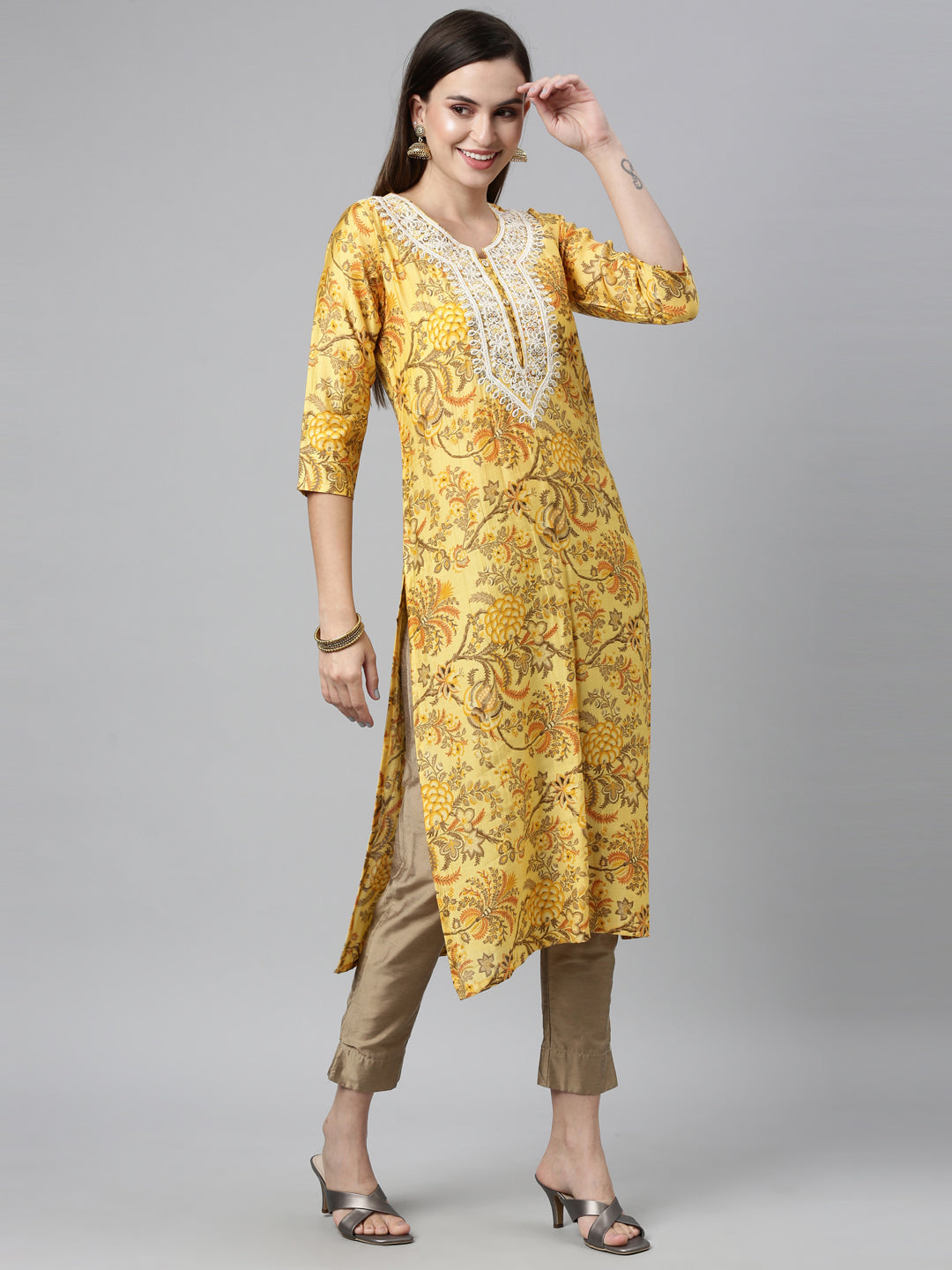 Neerus Yellow silk thread embroidered straight kurti - front view