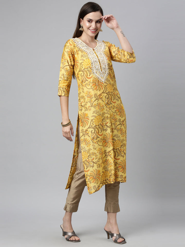 Neerus Yellow silk thread embroidered straight kurti - front view
