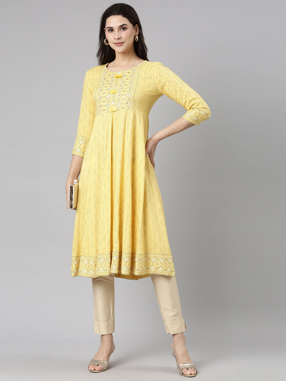 Neerus Yellow rayon printed anarkali kurti - front view