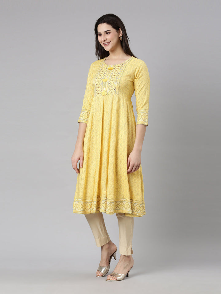 Neerus Yellow rayon printed anarkali kurti - side view