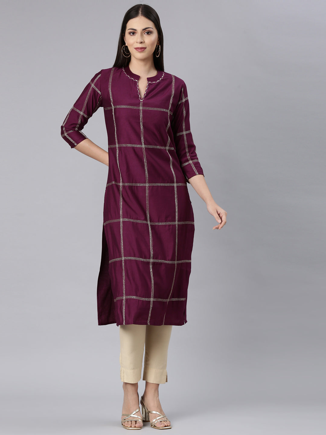 Neerus Maroon cotton solid straight kurta - front view