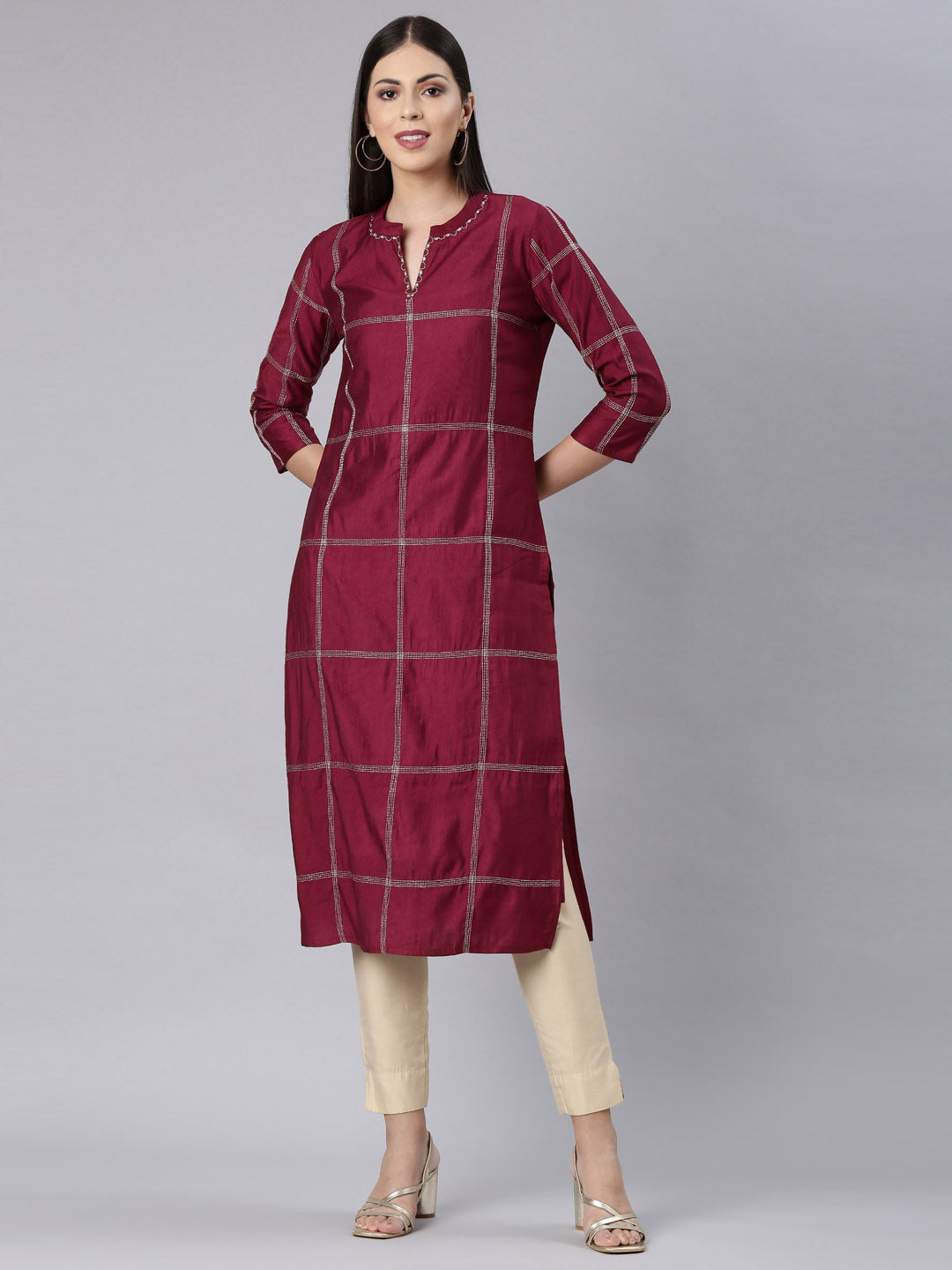 Neerus Maroon cotton solid straight kurti - front view