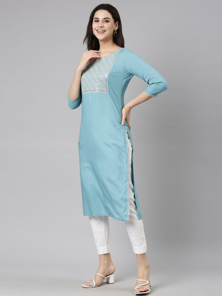 Neerus Blue solid panelled straight kurti - back view