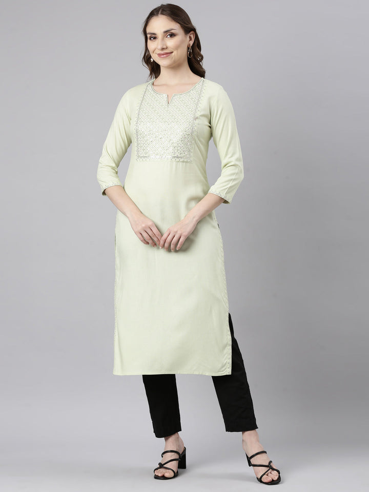Neerus Green rayon solid straight kurti - front view