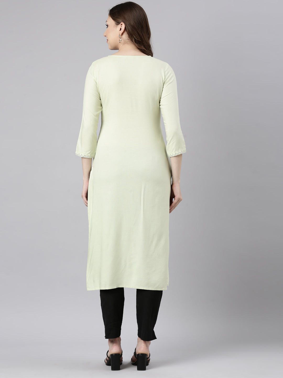Neerus Green rayon solid straight kurti - side view