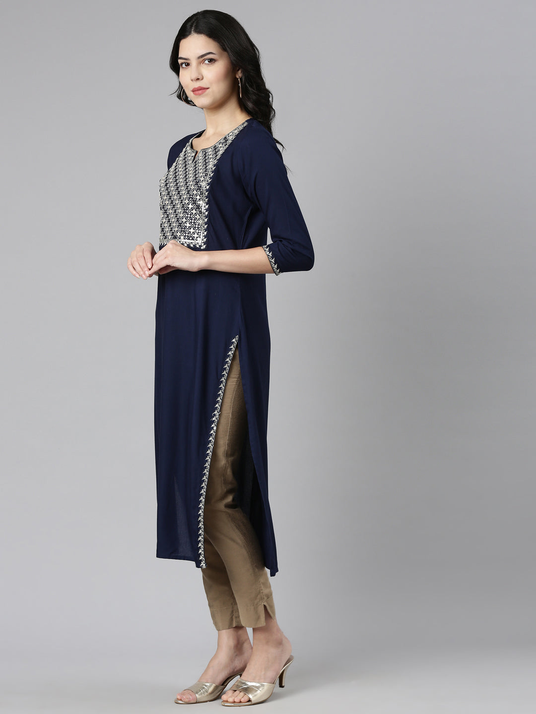 Neerus Blue solid straight kurti - back view