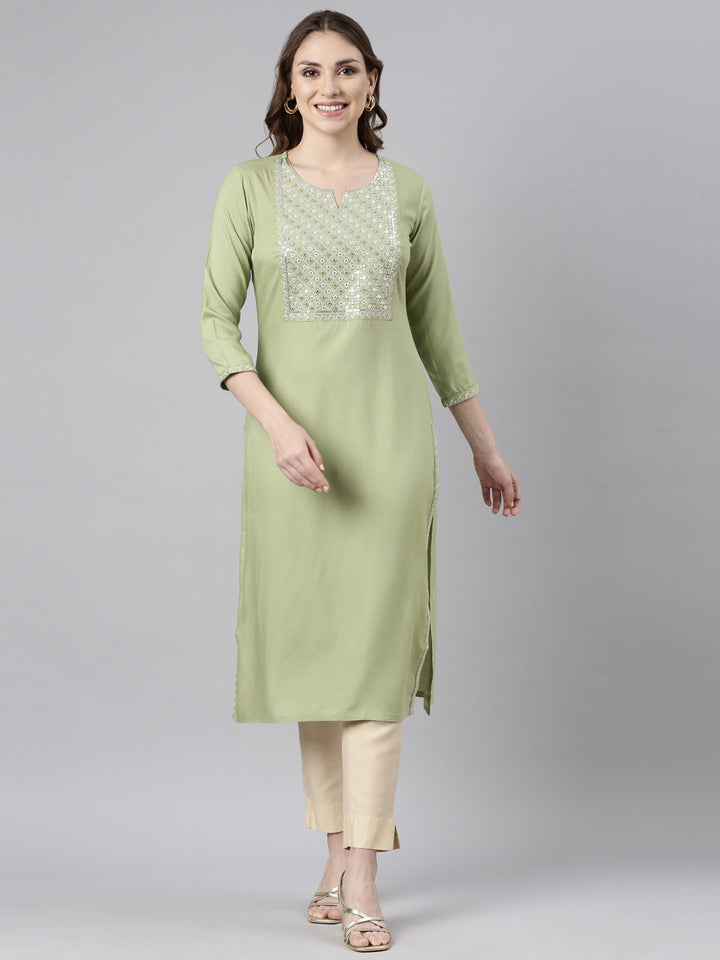 Neerus Green rayon solid straight kurti - front view