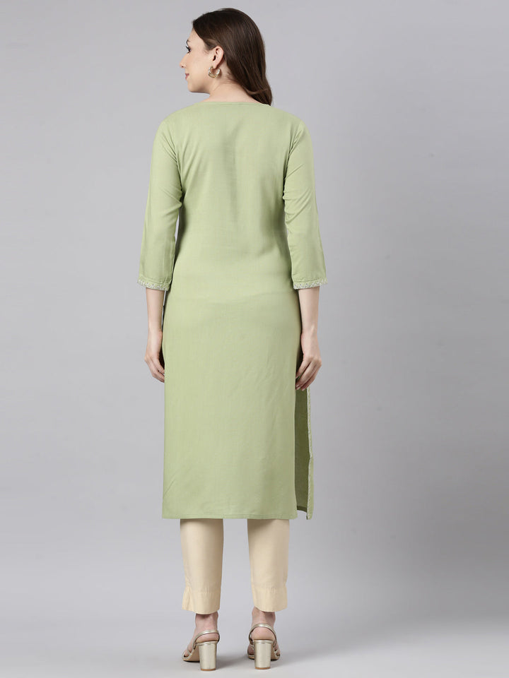 Neerus Green rayon solid straight kurti - side view
