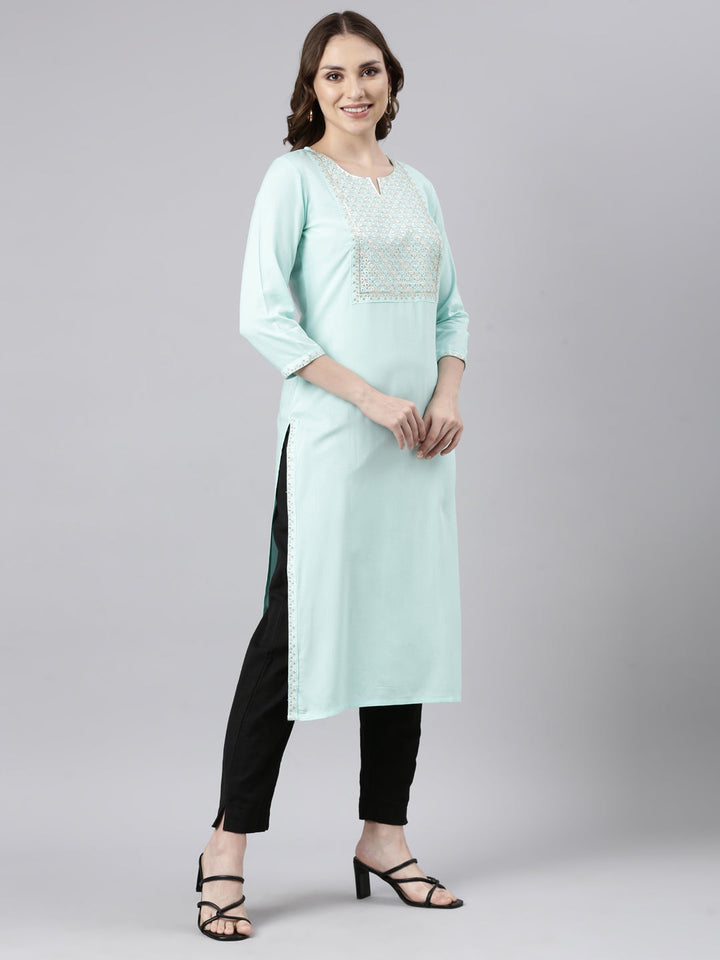 Neerus Green solid straight panelled kurti - back view