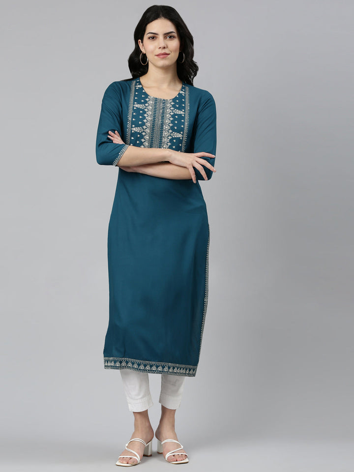 Neerus Green rayon solid straight kurti - front view