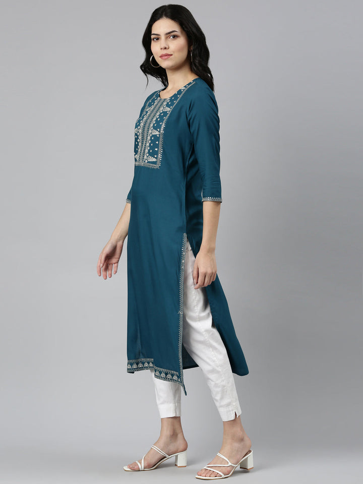 Neerus Green rayon solid straight kurti - back view