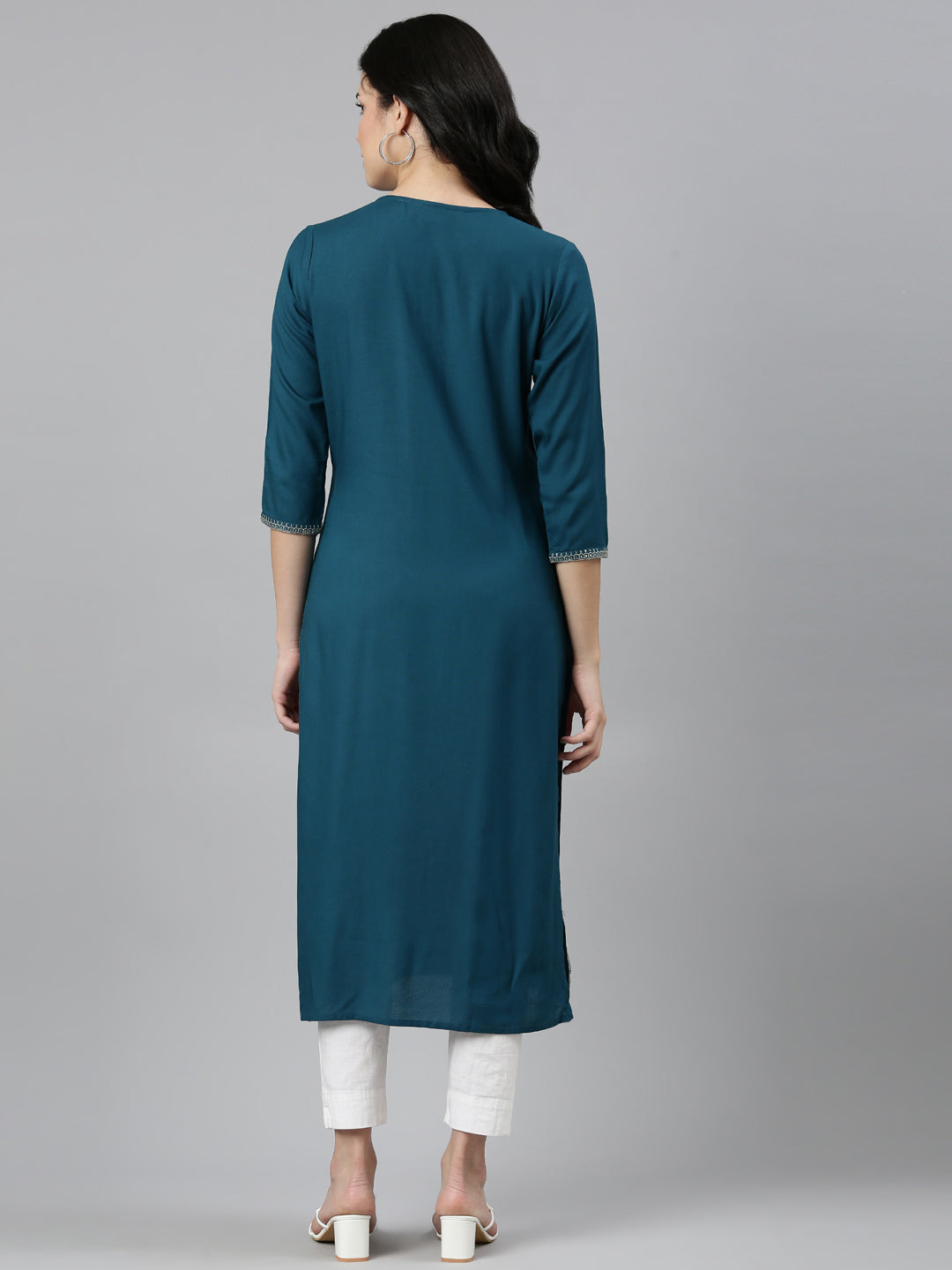 Neerus Green rayon solid straight kurti - side view