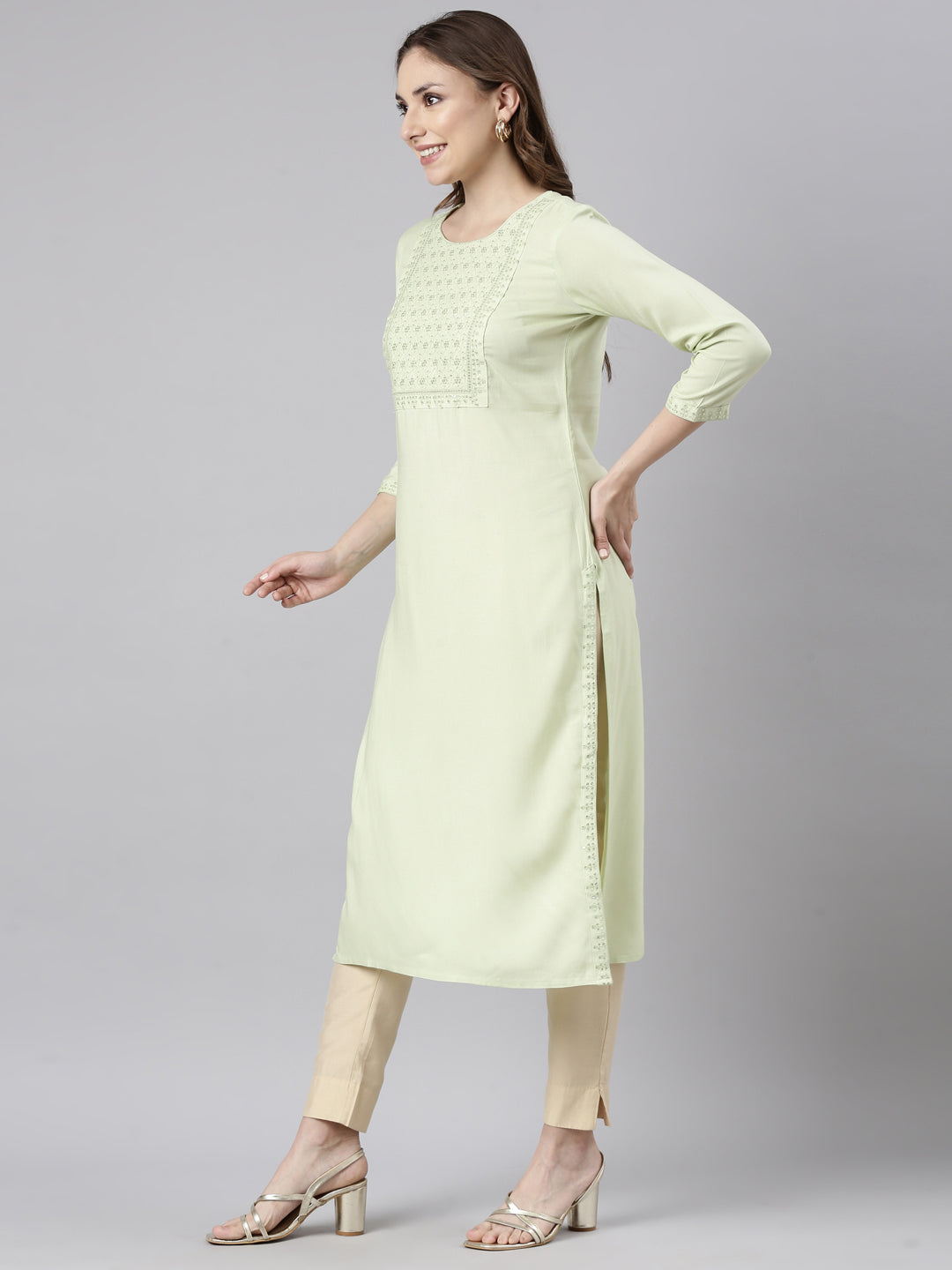 Neerus Green viscose rayon solid straight kurti - back view