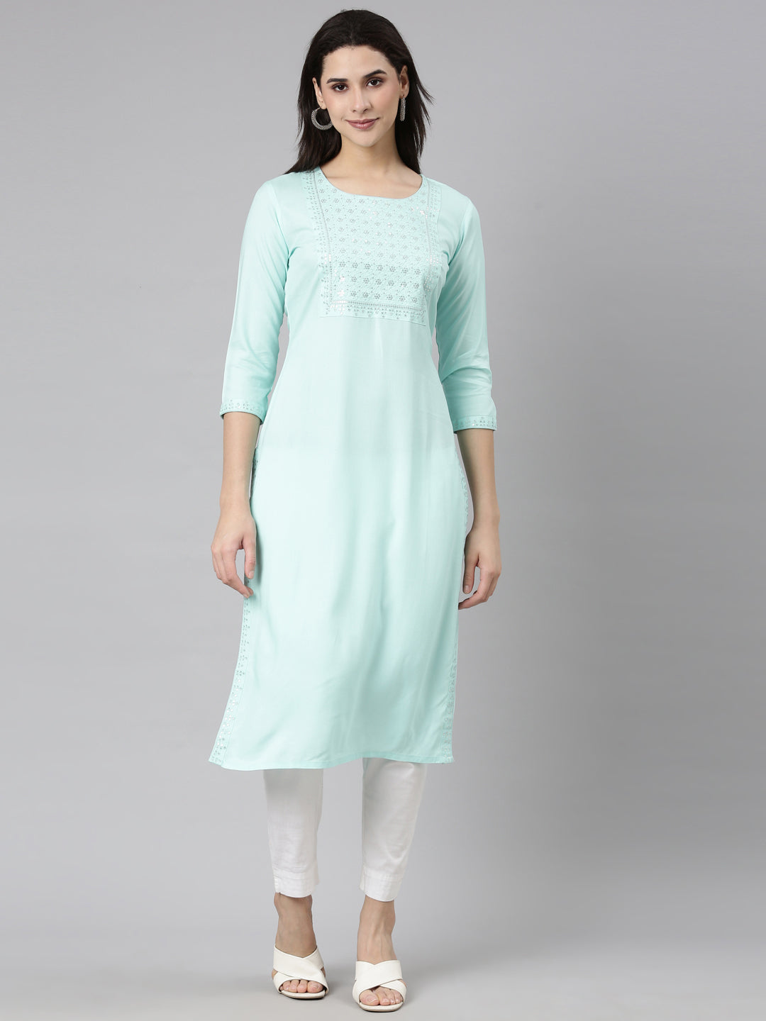 Neerus Green viscose rayon solid straight kurti - front view