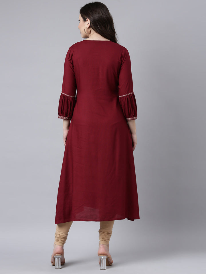 Neerus Maroon Rayon Woven Straight Kurti - side view